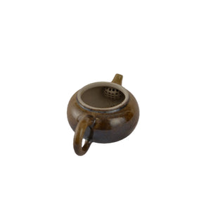 Interior view of PorSva No.64 wood-fired clay teapot showing natural unglazed interior
