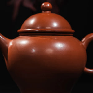 Close view of handmade Jianshui red clay Ding teapot