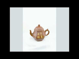 360° rotating view of PorSva No.54 hexagonal red Jianshui clay teapot with floral and calligraphy carving