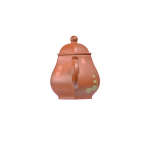 Back view of PorSva No.55 hexagonal red clay teapot highlighting geometric six-sided form