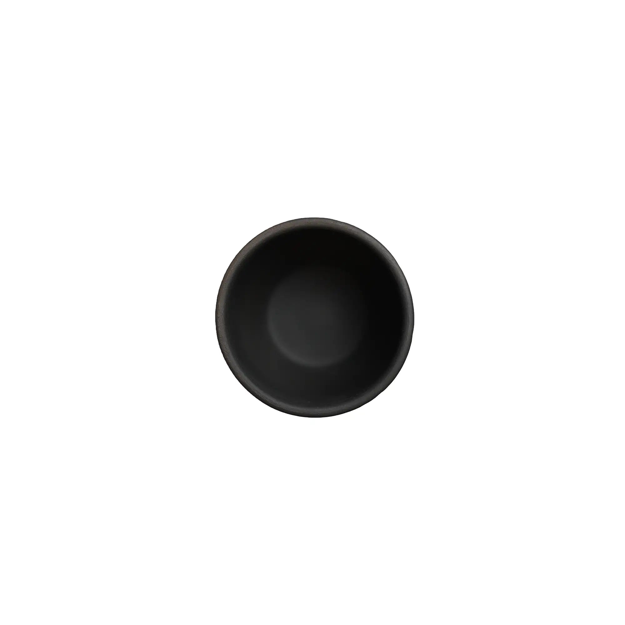 Top view of a Jianshui zitao dark clay master tea cup with a smooth unglazed interior