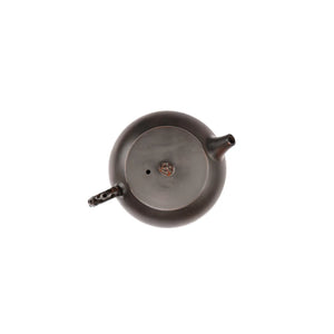 Jianshui zitao black clay teapot, top view showing lid and spout alignment.