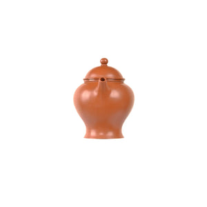 Jianshui zitao red clay ding-shaped teapot, front view with spout.