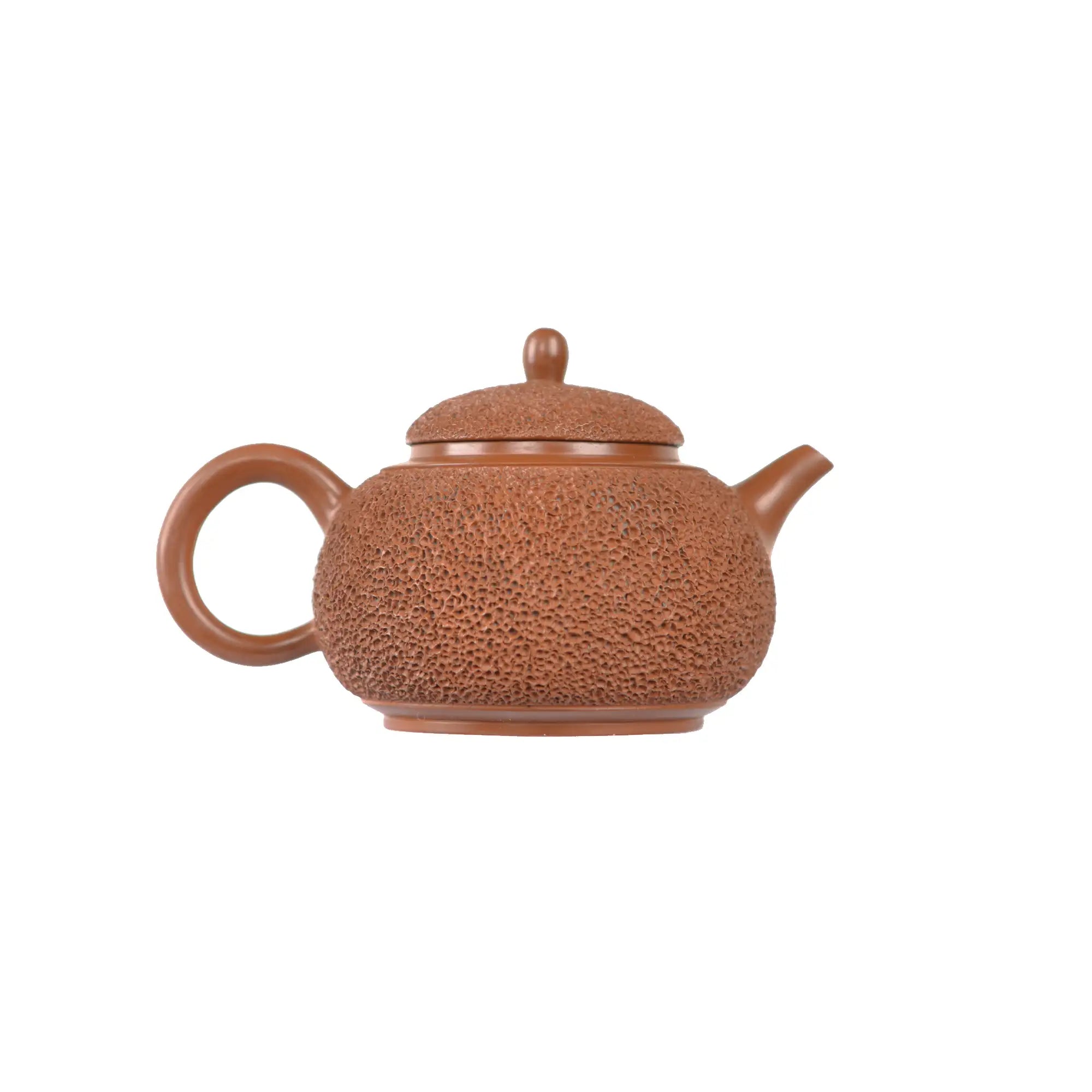 Jianshui zitao red clay teapot featuring dense needle-textured surface, side view.