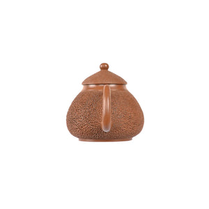 Jianshui zitao red clay pear-shaped teapot with continuous needle-punctured texture, back view