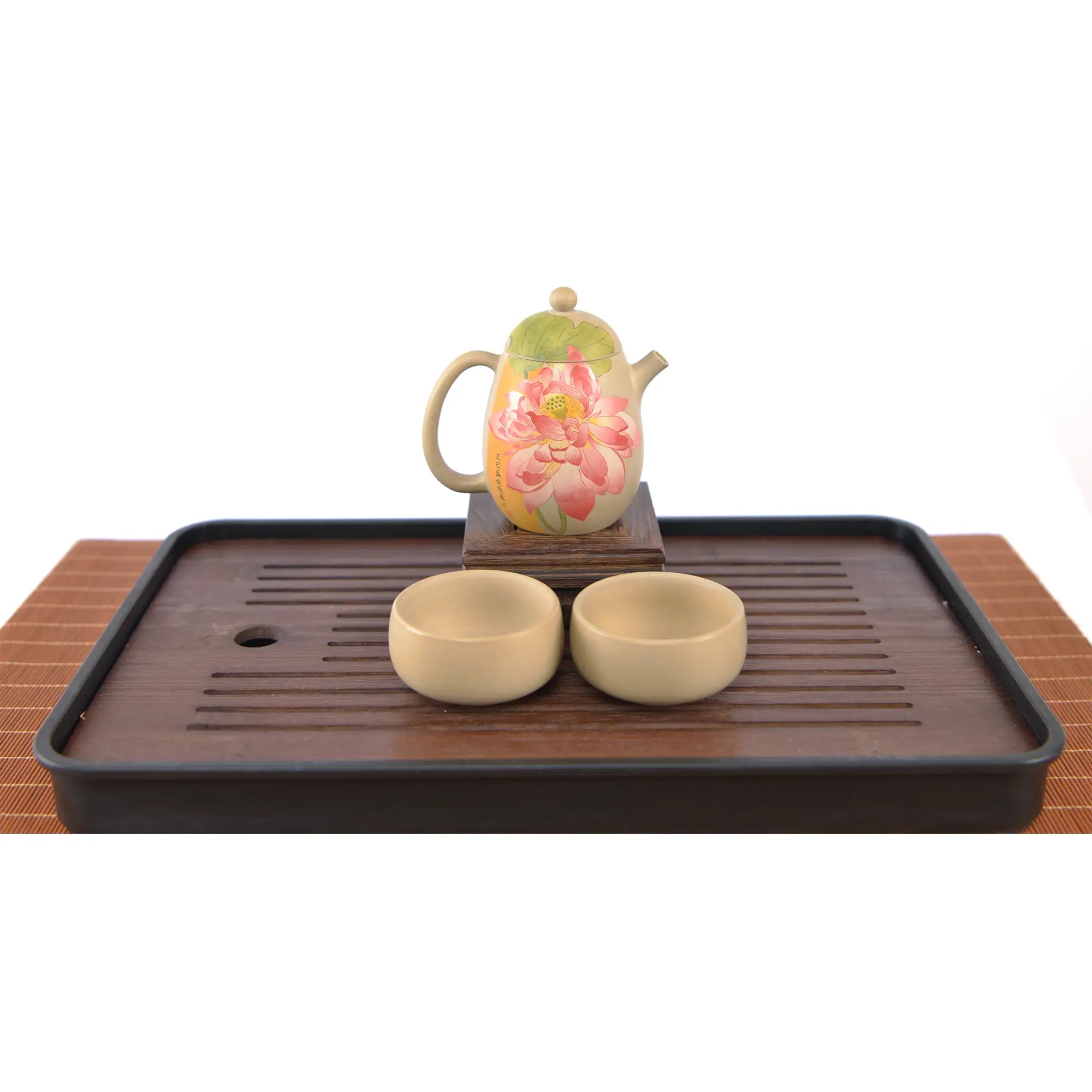 Handcrafted white clay lotus teapot set with two matching cups, featuring a hand-carved floral design.