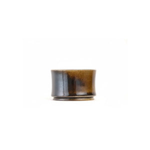 Jianshui zitao wood-fired cup with gently settled ash tones formed in the kiln, side view