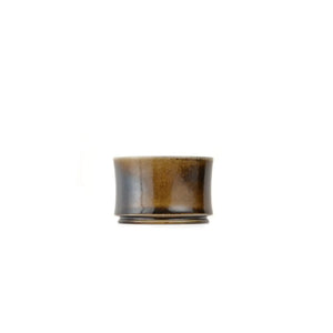 Jianshui zitao wood-fired cup featuring a raw unglazed surface with subtle natural variation, side view