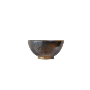 Jianshui zitao wood-fired cup with concentrated ash accumulation and dark-to-light contrast, side