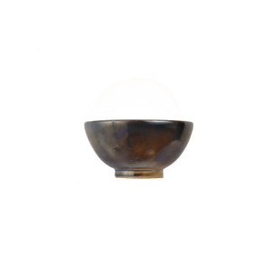 Jianshui zitao wood-fired cup featuring a raw unglazed surface with organic variation, side view