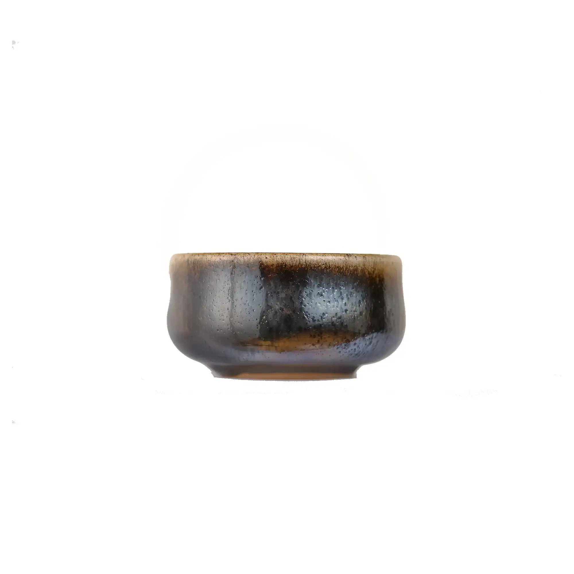 Jianshui zitao wood-fired cup showing layered earthy coloration shaped by flame, side view