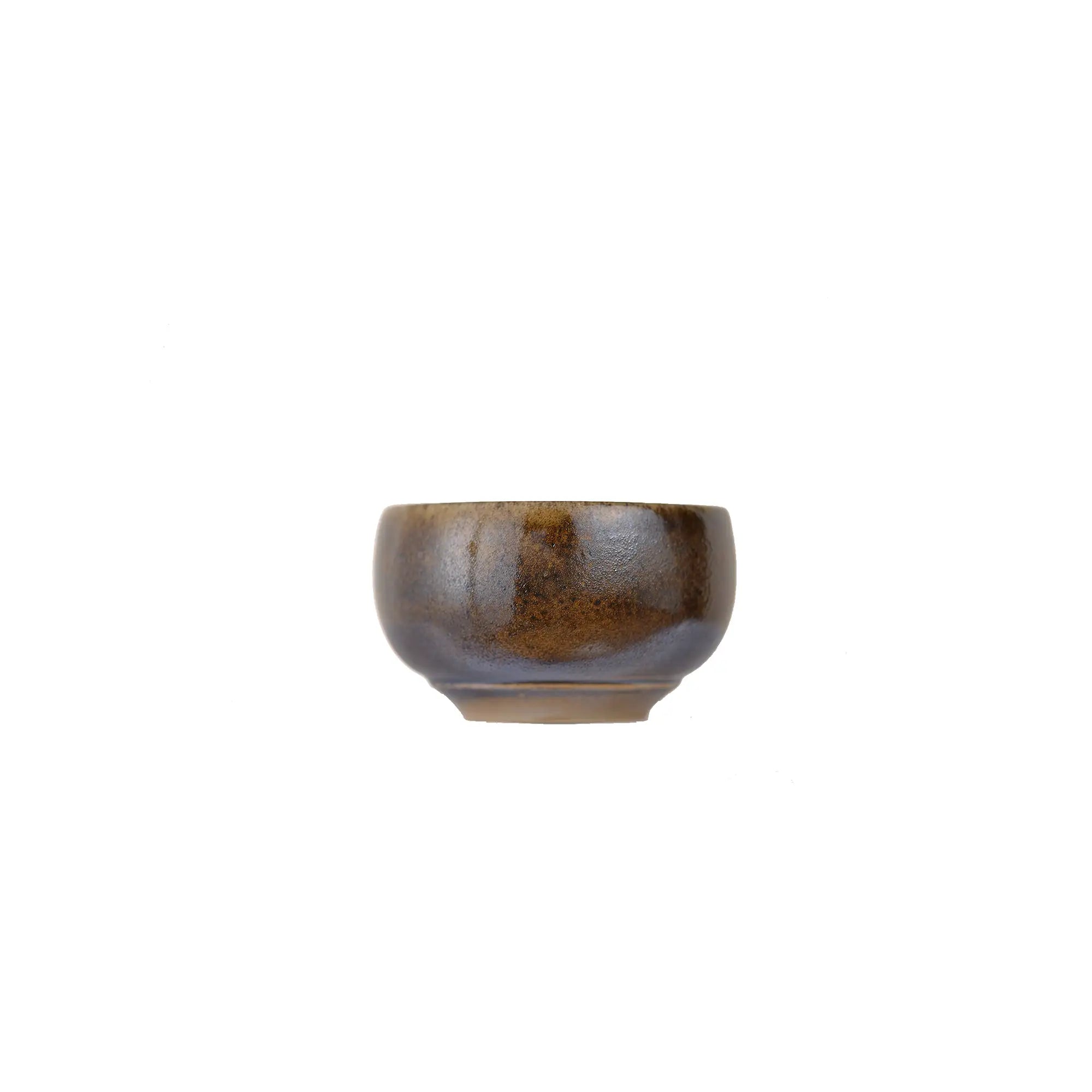 Jianshui zitao wood-fired cup showing soft tonal layering created by prolonged firing, side view