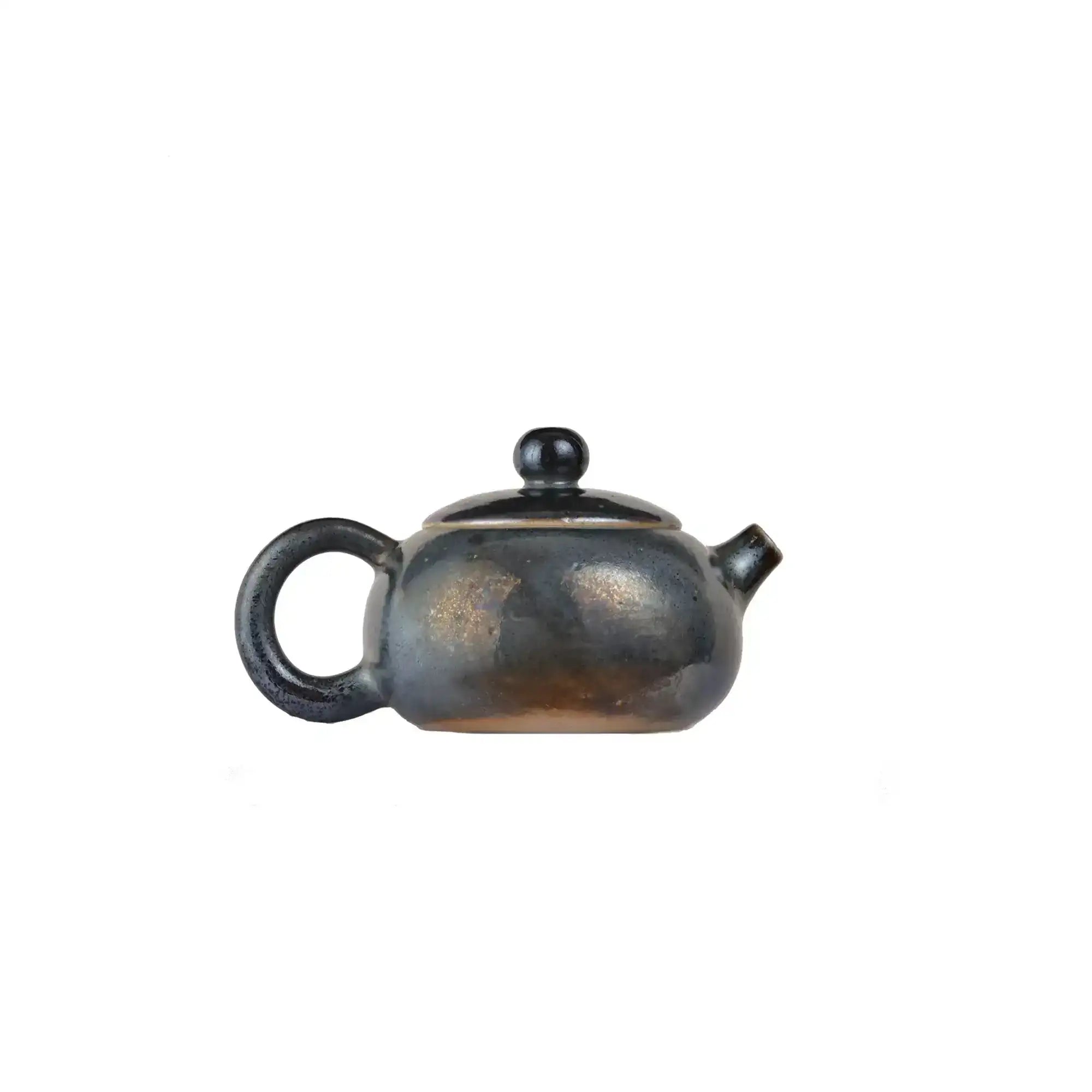 Jianshui zitao wood-fired teapot featuring subdued luster created by flame and kiln atmosphere, side view.