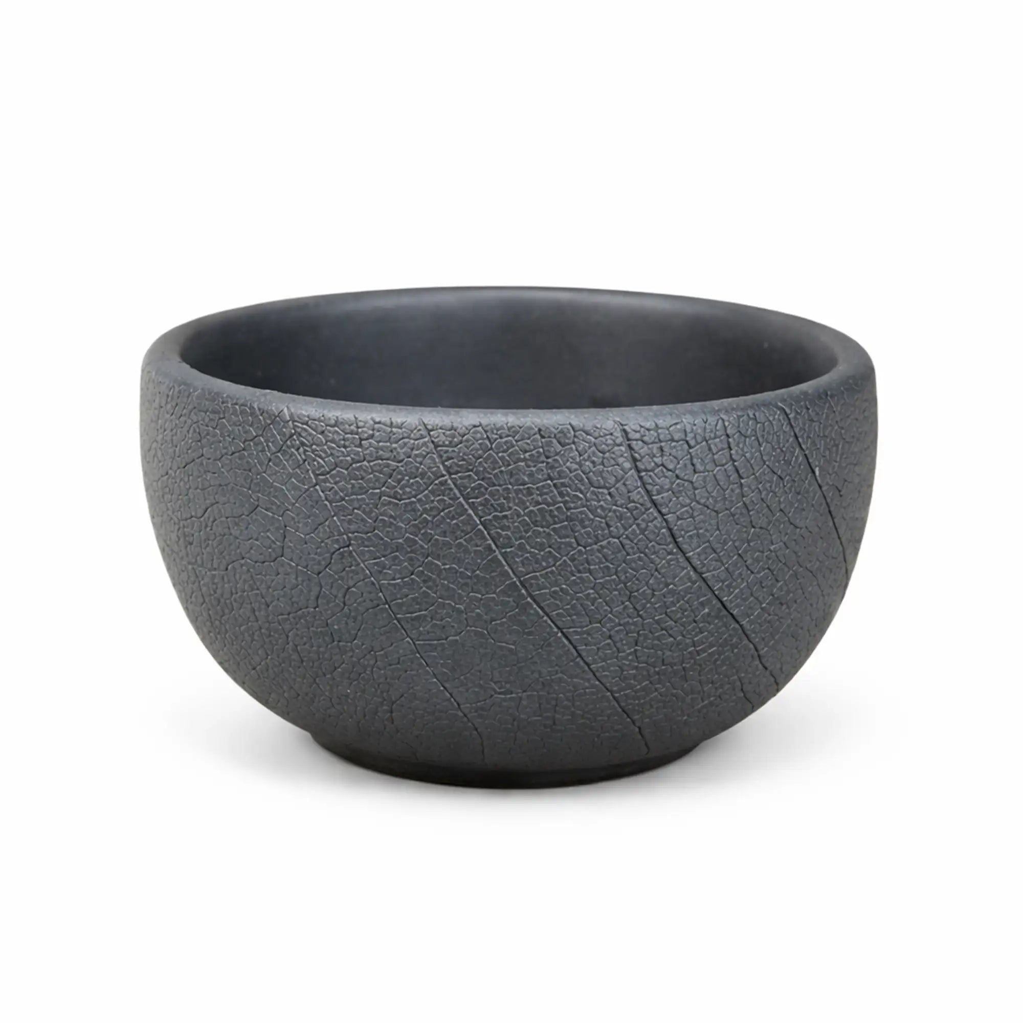 Jianshui zitao small tea cup with a natural unglazed surface and subtle textured finish