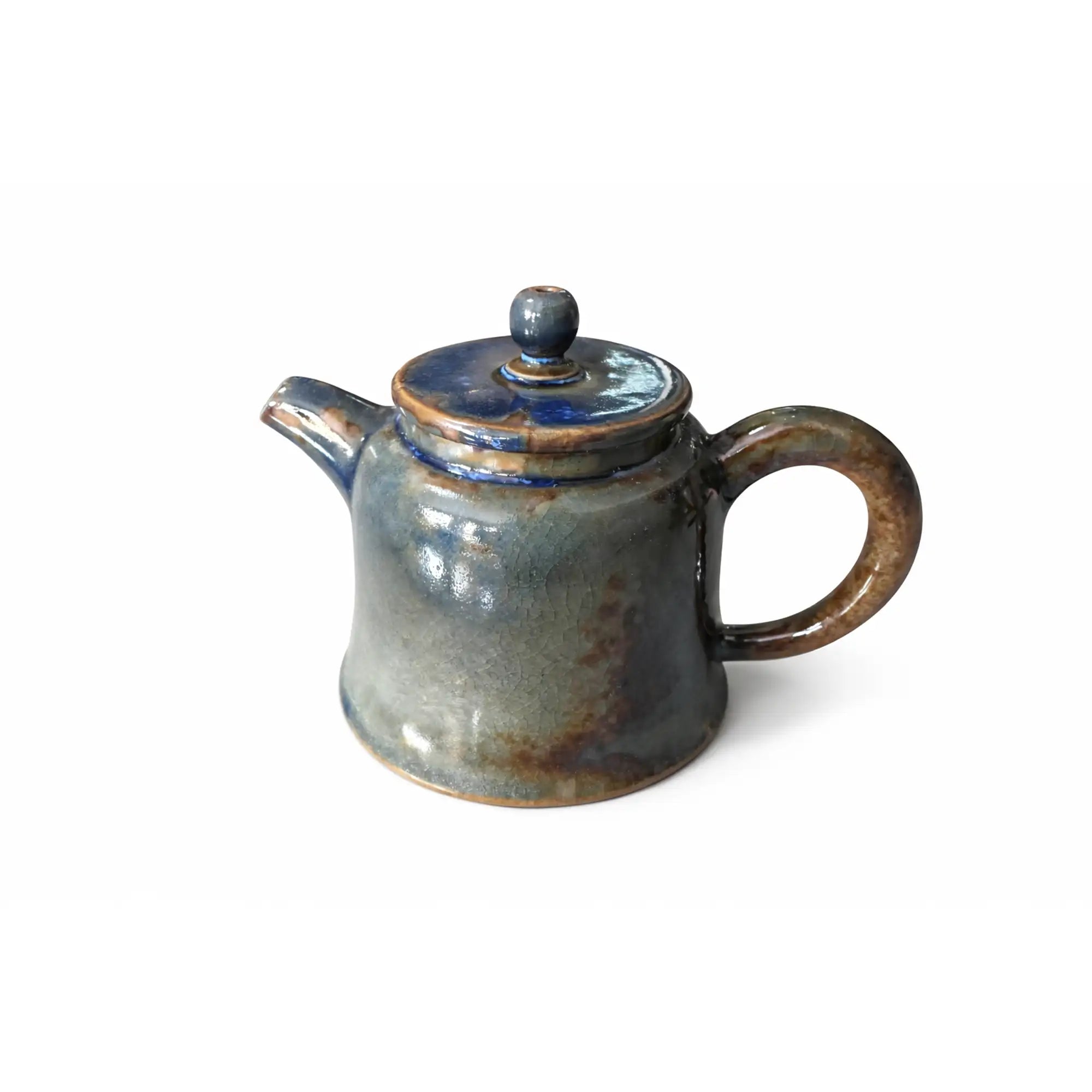Handcrafted wood-fired Jianshui zitao teapot featuring natural ash deposits and kiln-born textures