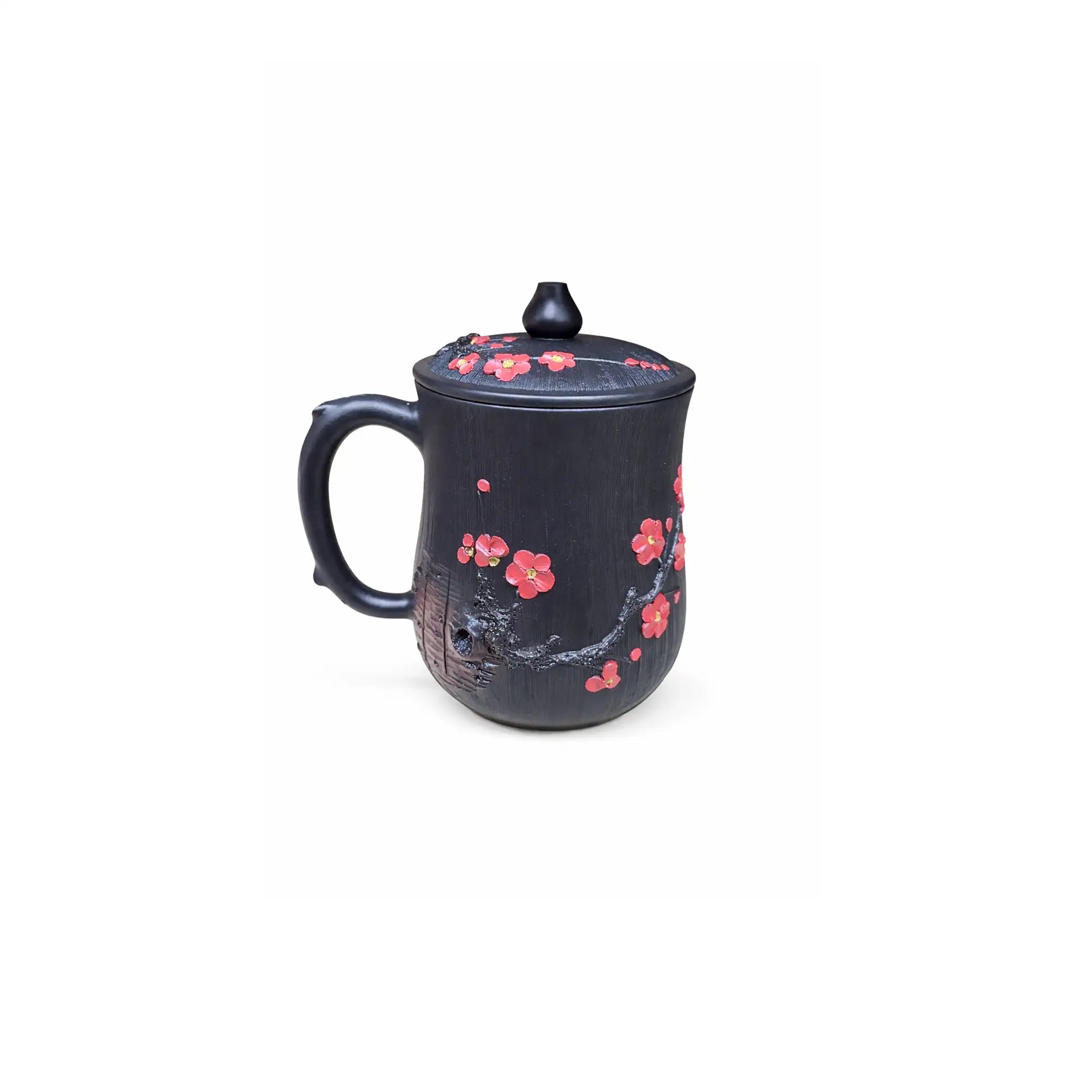 Jianshui zitao pottery office mug featuring hand-carved plum blossom motifs with clay inlay