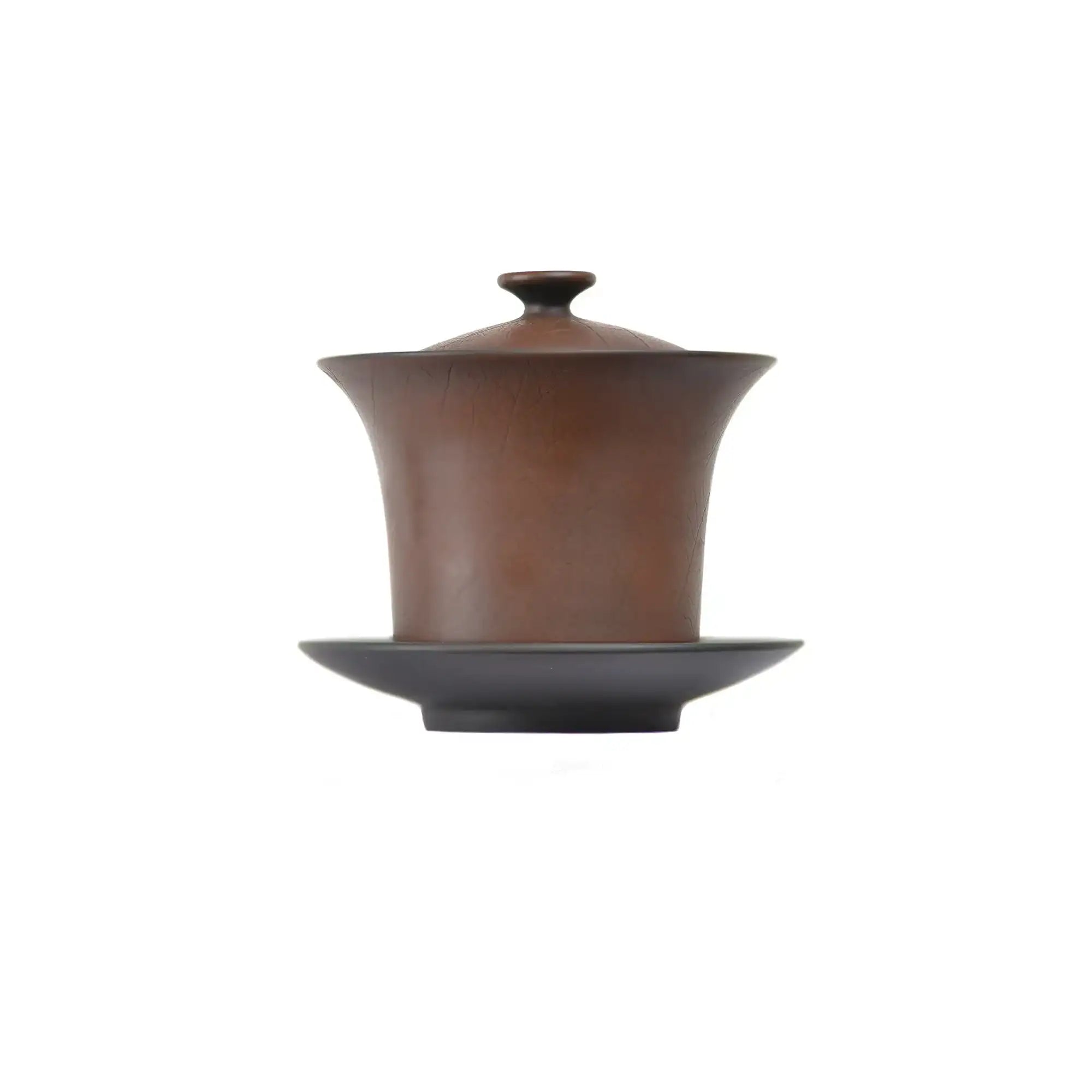 Handcrafted Jianshui zitao lidded teacup features a fluid design with Bodhi  detail, a flared rim, and comes with a matching saucer