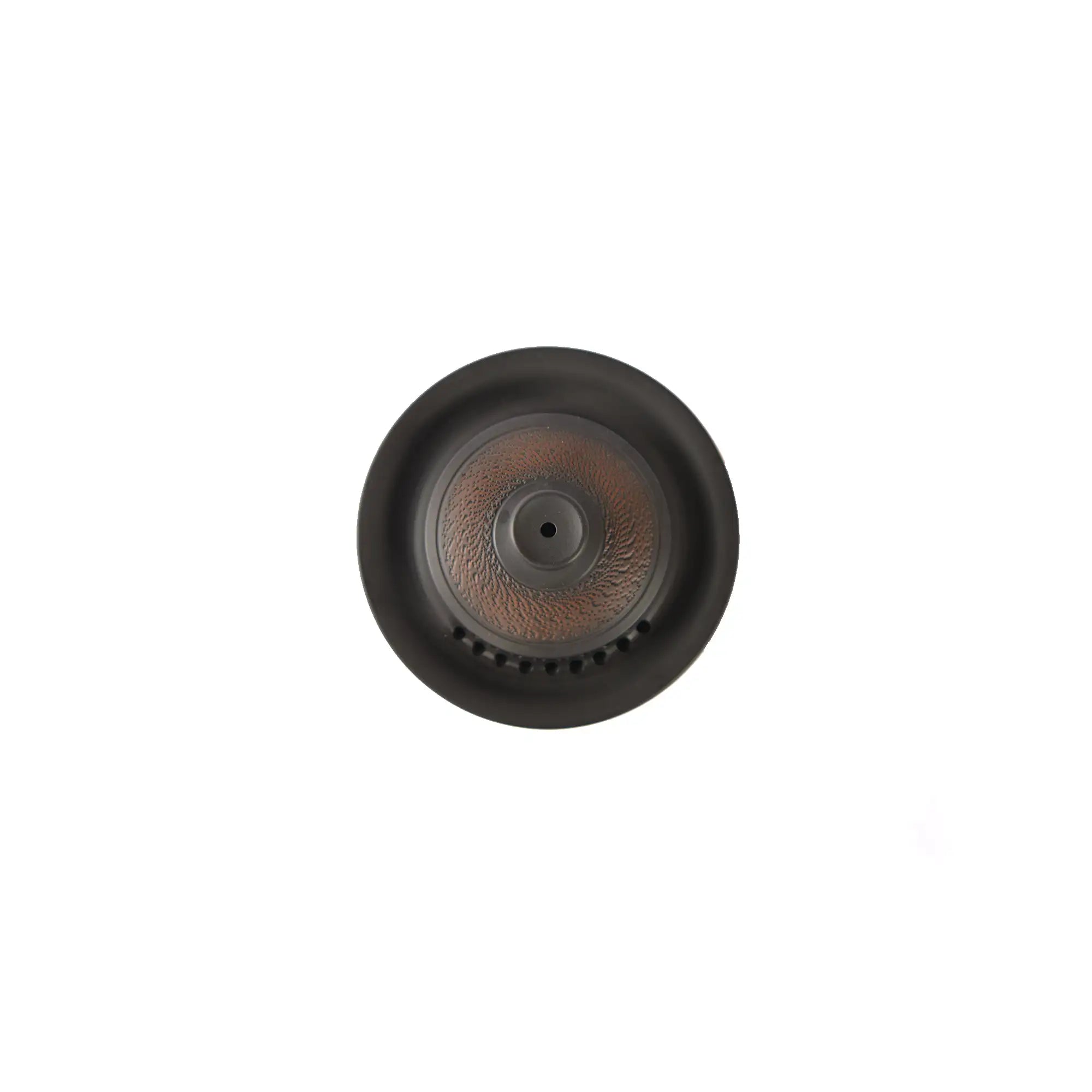 Top view highlighting the chattered texture and evenly spaced filter holes on a Jianshui zitao gaiwan lid
