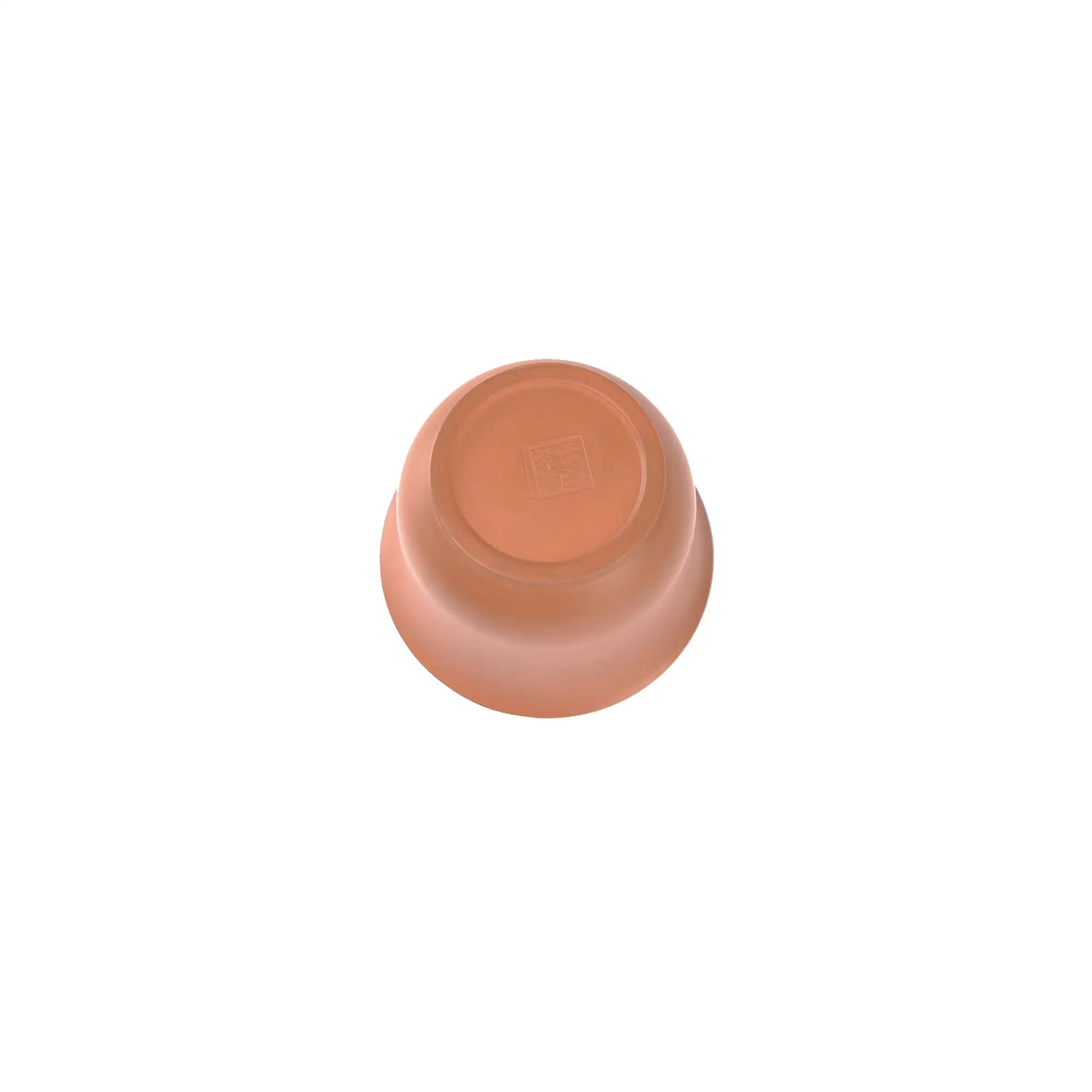 Bottom view of a Jianshui zitao red clay gaiwan showing a softly impressed maker’s mark and hand-finished base