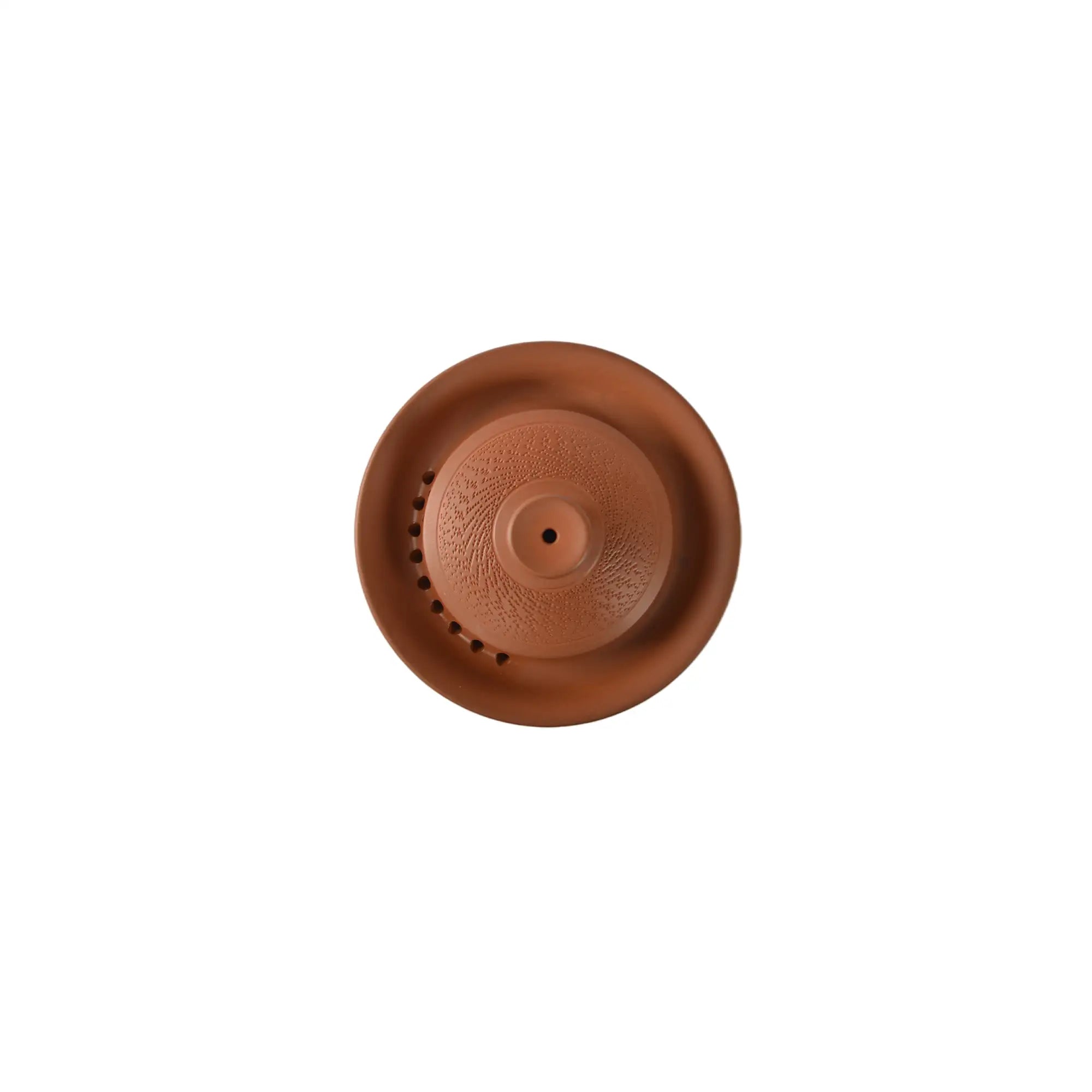 Top view of a Jianshui zitao red clay gaiwan with a jumping-knife textured surface and a lid with filter holes