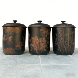 Jianshui zitao storage jars with hand-engraved line carving and unglazed pottery surfaces