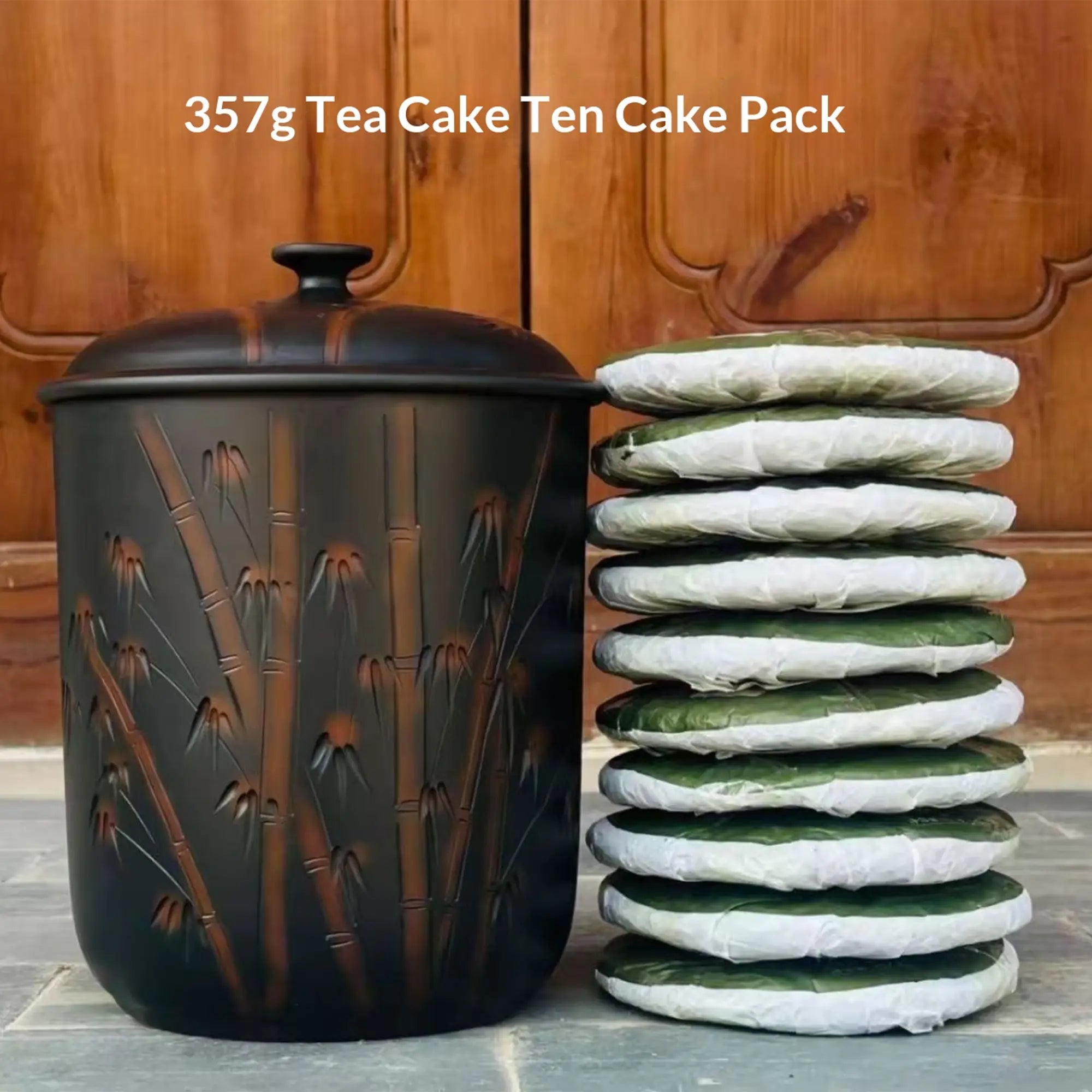 Jianshui zitao line-engraved storage jar shown with an example of storing multiple 357g tea cakes