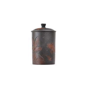 Front view of a Jianshui zitao lidded office mug with a hand-carved lotus flower design