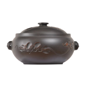 Handcrafted Jianshui zitao pottery steam pot (black) with a line-carved lotus flower design and fitted lid