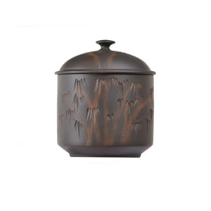 Handcrafted Jianshui zitao tea canister (black) with hand-carved bamboo design and smooth matte finish