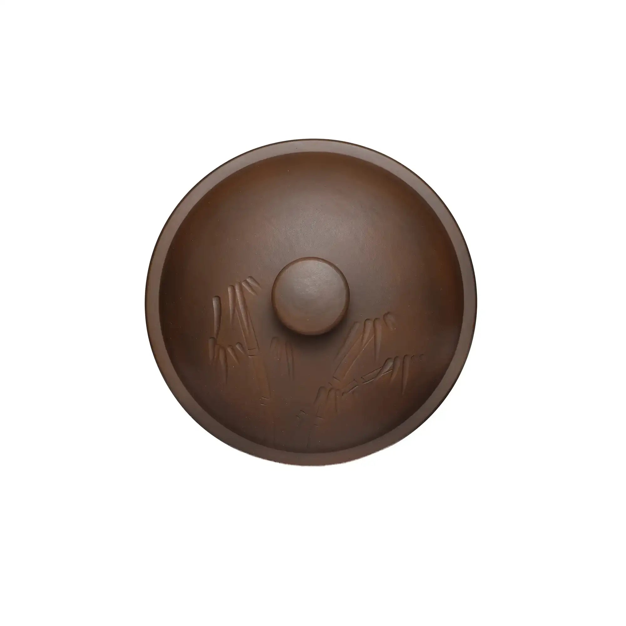 Top view of a Jianshui zitao tea canister (red clay) featuring a hand-carved bamboo pattern and smooth matte finish on the lid