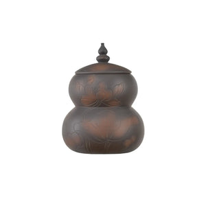 Handmade pottery tea canister with a double-gourd shape and hand-carved lotus flower design.