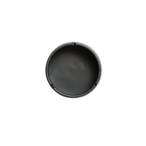 Top view of a jianshui zitao ashtray with a smooth matte interior and cigarette rests.