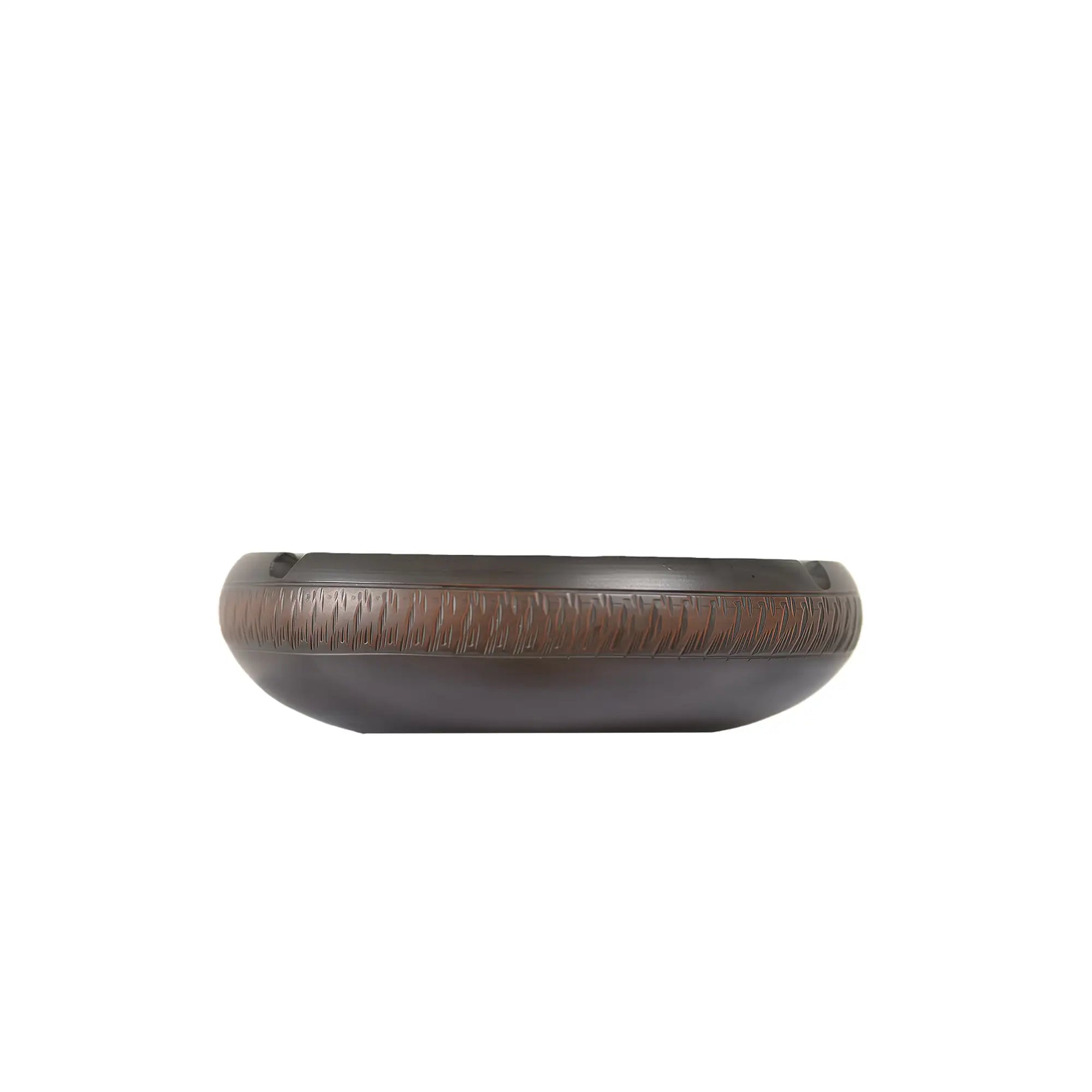Side view of a handcrafted Jianshui zitao ashtray featuring a chattering-carved surface texture