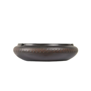 Handmade pottery ashtray with a chattering-carved texture and low-profile rounded form