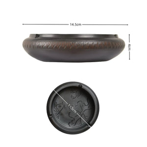 Dimensions of a handmade pottery ashtray with chattering-carved texture and fish and lotus leaf motif, showing 14.5 cm diameter and 4 cm height