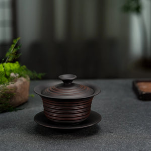 Side view of Jianshui clay gaiwan with natural unglazed finish