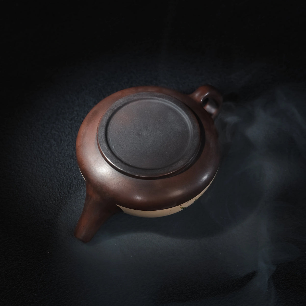 Bottom view of handmade Jianshui clay teapot