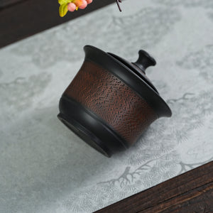 Close view of chattering texture on Jianshui black clay teapot
