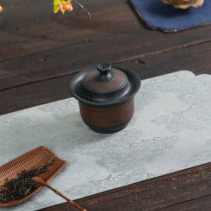 Top view of handmade Jianshui black handleless teapot
