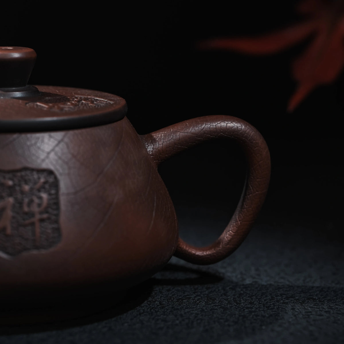 Bodhi and peony relief decoration on Jianshui clay teapot
