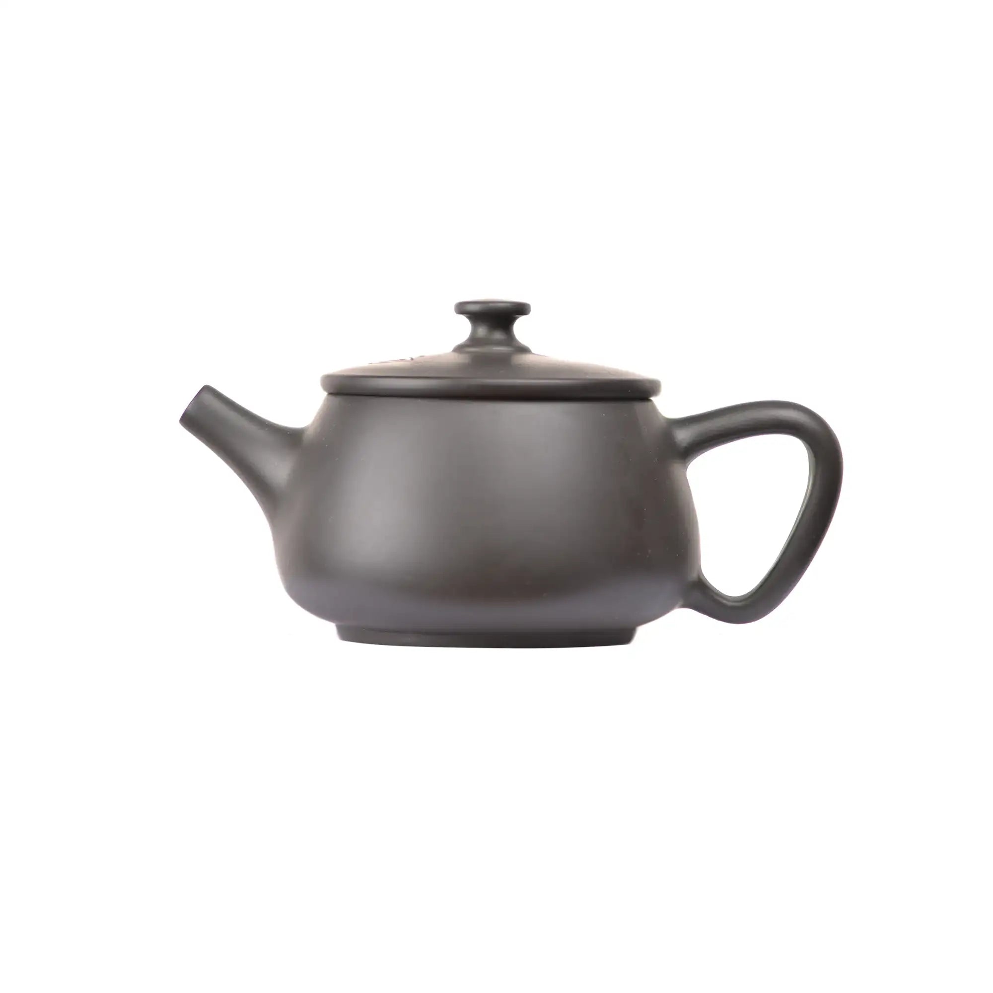 Left side view of PorSva No.39 Hanwa clay teapot with smooth uncarved surface