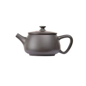 Left side view of PorSva No.39 Hanwa clay teapot with smooth uncarved surface