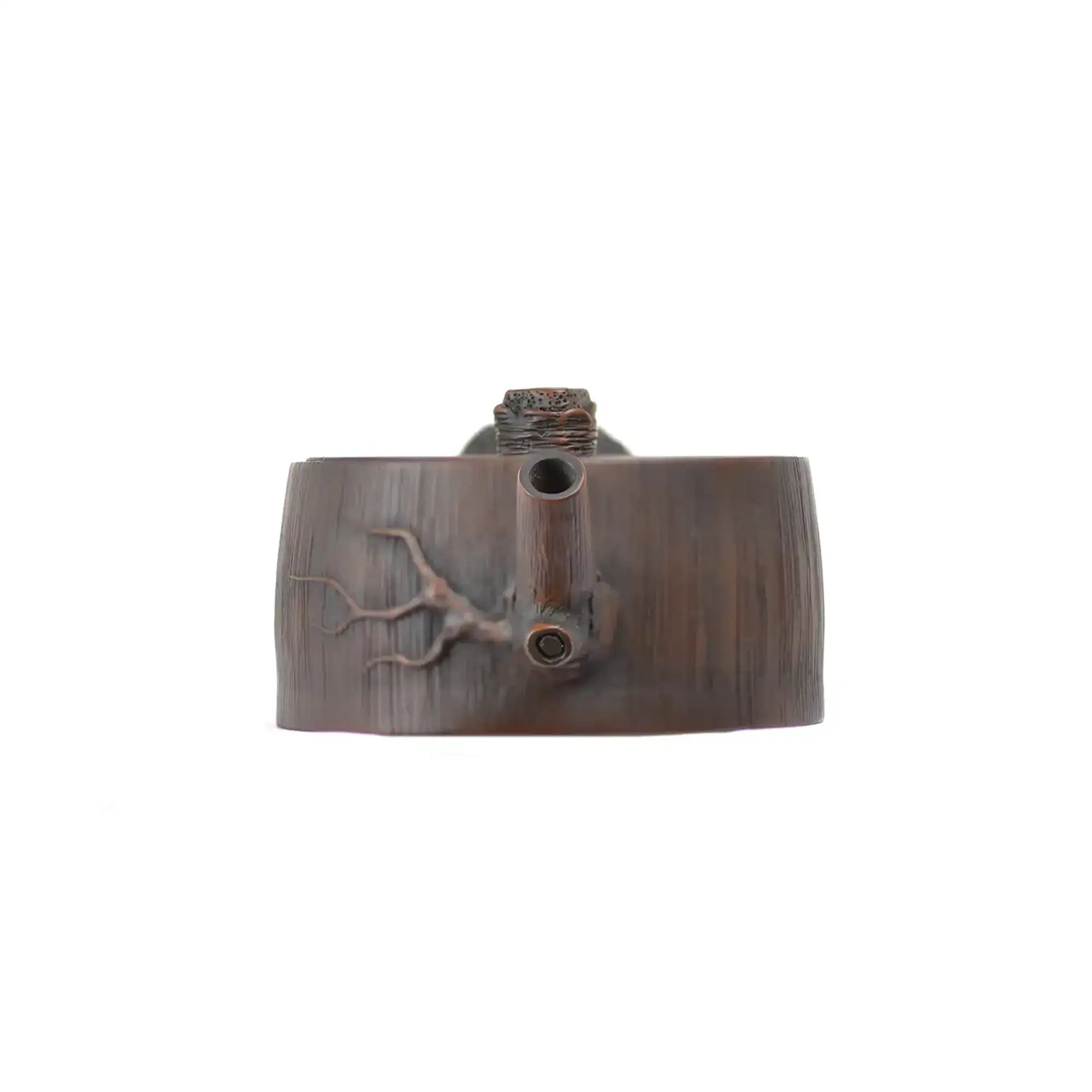 Front view of PorSva No.53 root-style clay teapot inspired by natural tree root form