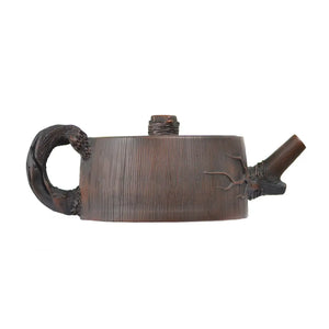 Right side view of PorSva No.53 root-style clay teapot highlighting organic branch-inspired form