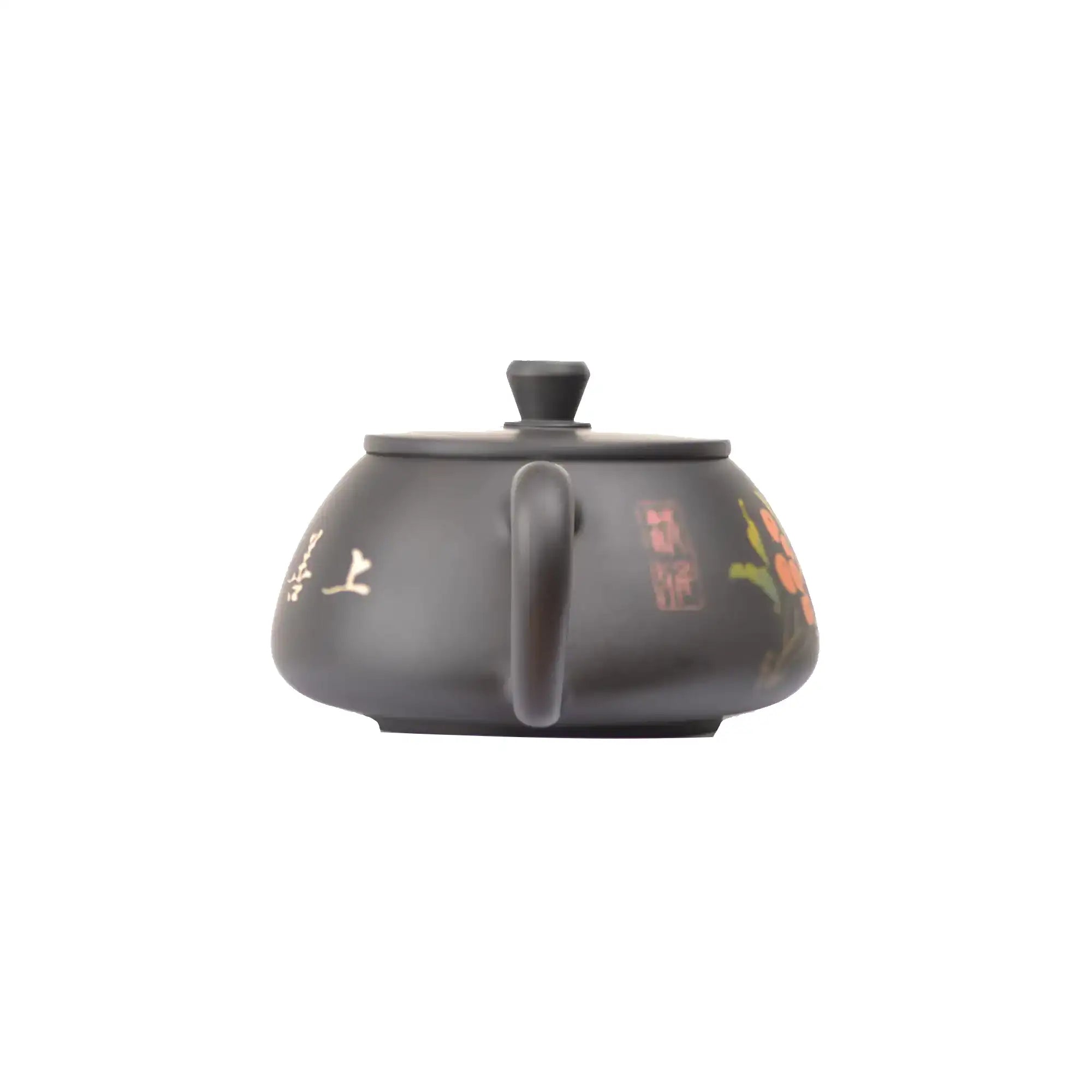 Back view of clay teapot No.27 featuring traditional yin carving and yang inlay decoration