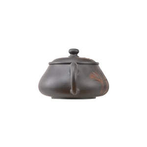 Back view of handcrafted clay teapot No.4 with clean pottery finish