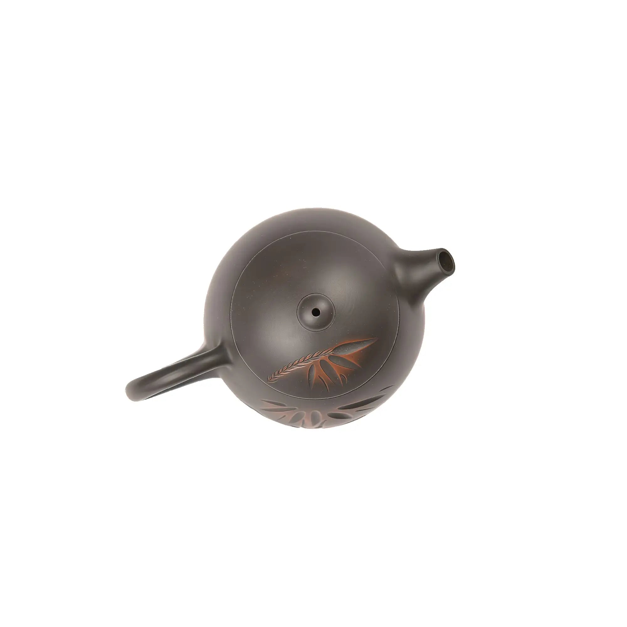 Top view of clay teapot No.6 highlighting lid shape and bamboo carved design