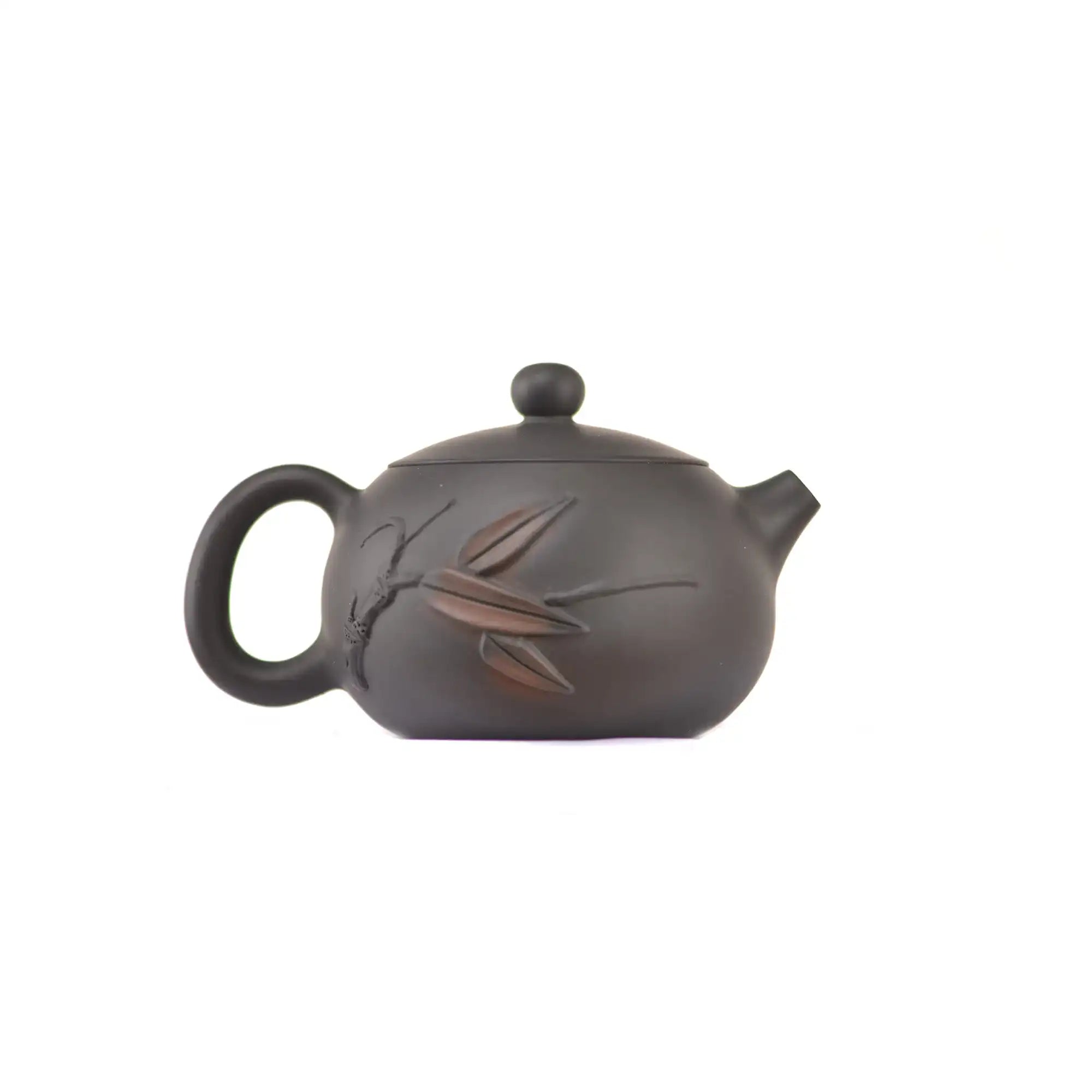 Side view of clay teapot No.16 showing raised bamboo relief design