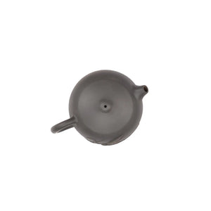 Top view of clay teapot No.16 highlighting lid shape and bamboo relief detail