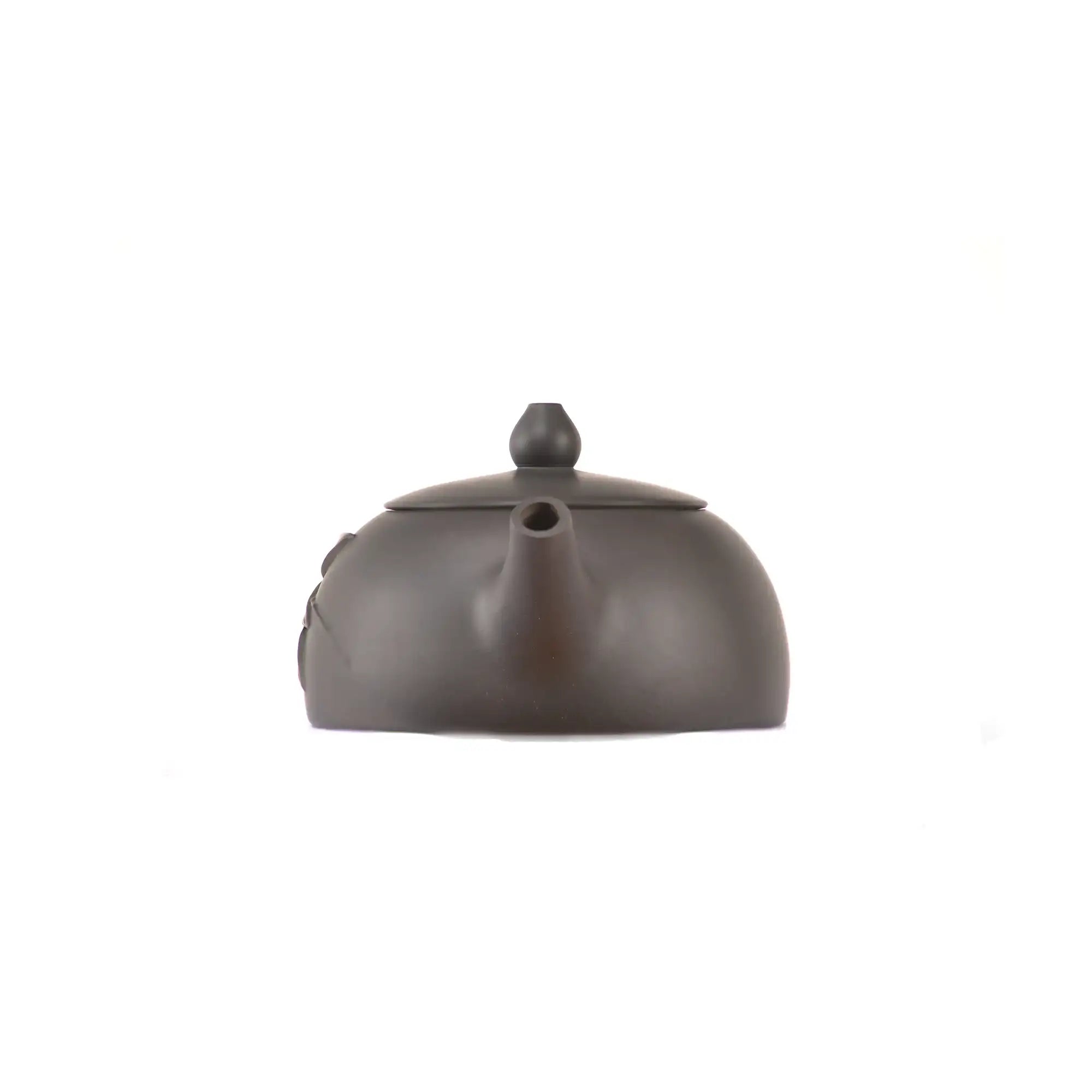 Handcrafted clay teapot No.17 featuring bamboo relief detailing and unglazed finish